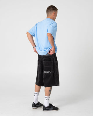 Man wearing Fragment Short Sleeve Tee in Sky Blue