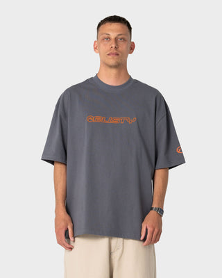 Man wearing Outliner Short Sleeve Tee in Steel