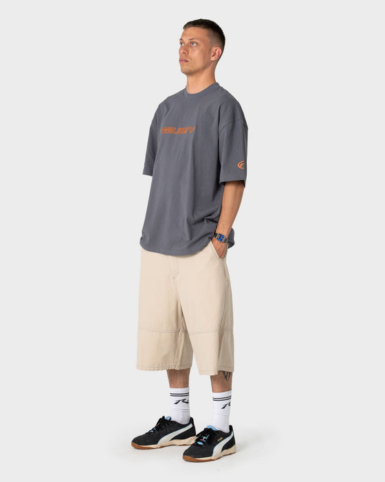 man-wearing-outliner-short-sleeve-tee-in-steel