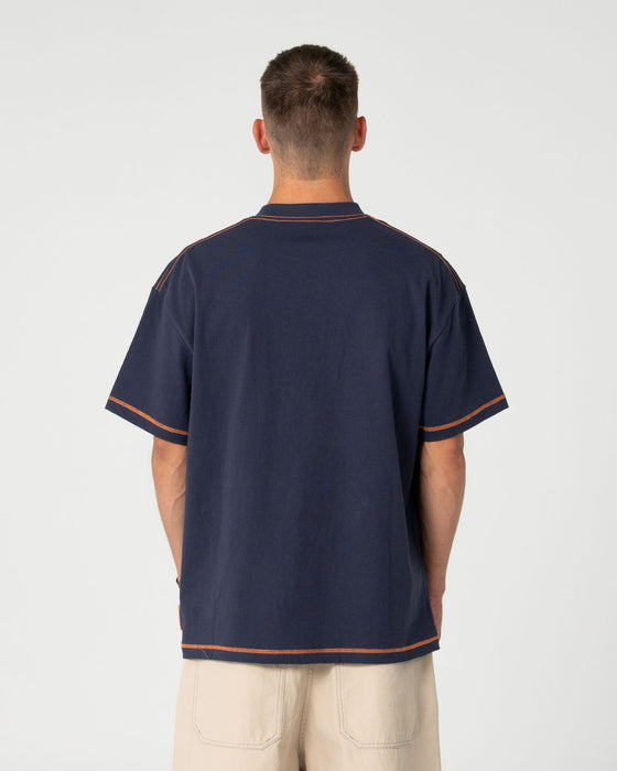 man-wearing-bus-down-short-sleeve-tee-in-dark-blue