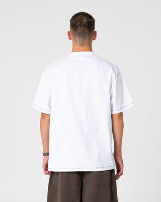 Man wearing Bus Down Short Sleeve Tee in White