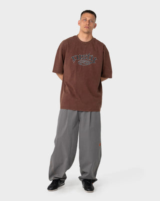 Man wearing Smacko Short Sleeve Tee in Pinecone