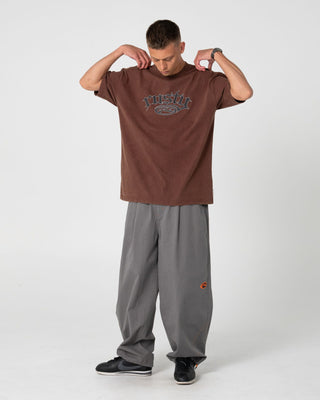 Man wearing Smacko Short Sleeve Tee in Pinecone