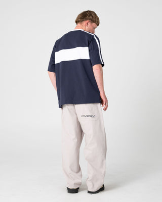Man wearing Super Shaolin 3.0 Short Sleeve Tee in Dark Blue