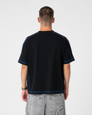 Man wearing Gridlock Short Sleeve Tee in Black