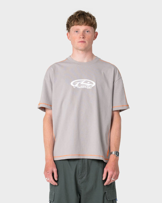 man-wearing-gridlock-short-sleeve-tee-in-stone-grey