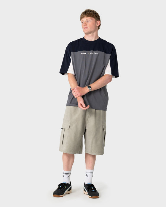 man-wearing-genetika-short-sleeve-tee-in-steel