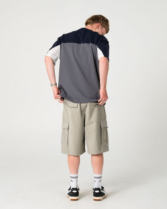 man-wearing-genetika-short-sleeve-tee-in-steel