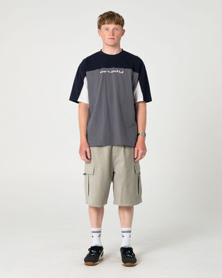 Man wearing Genetika Short Sleeve Tee in Steel