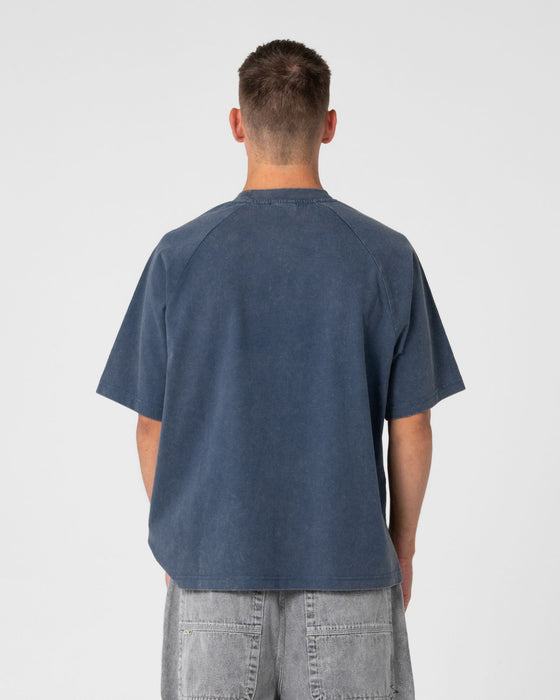 man-wearing-trawla-short-sleeve-tee-in-atlantic-blue