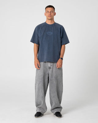 Man wearing Trawla Short Sleeve Tee in Atlantic Blue
