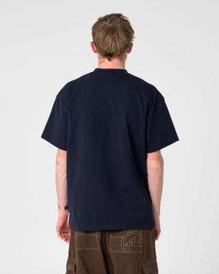 Man wearing Four By Four Short Sleeve Tee in Navy Blue