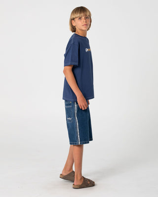 Boy wearing Flip Daddy Taped Jort Boys in Deep Sea Blue