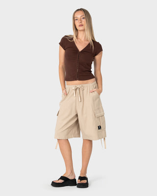 Woman wearing River Low Rise Baggy Cargo Short in Oatmeal