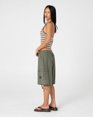 Woman wearing River Low Rise Baggy Cargo Short in Shadow Army
