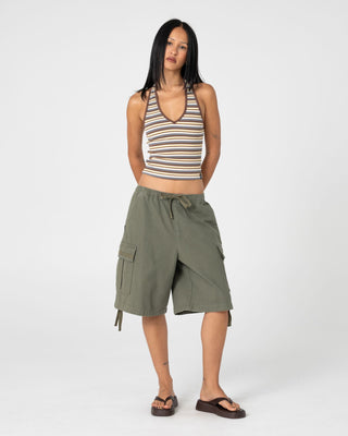 Woman wearing River Low Rise Baggy Cargo Short in Shadow Army