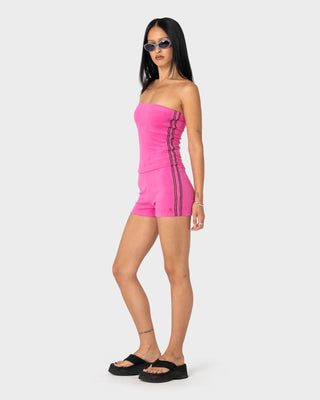 Woman wearing Lamar Towelling Booty Short in Fuchsia Pink