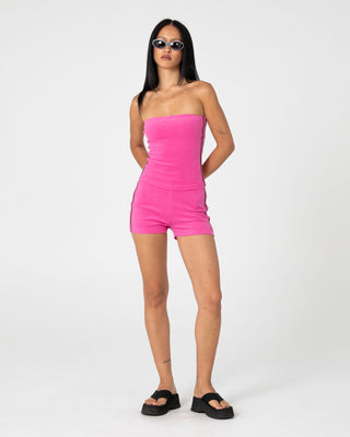 Woman wearing Lamar Towelling Booty Short in Fuchsia Pink