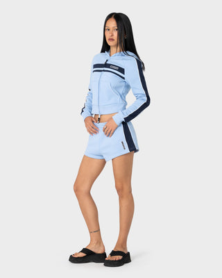 Woman wearing Retro Lines Mini Fleece Short in Retro Blue
