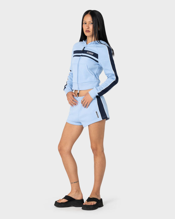 woman-wearing-retro-lines-mini-fleece-short-in-retro-blue