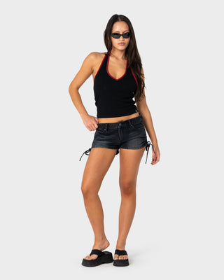 Woman wearing Hackney Low Rise Micro Mini Short in Blasted Black