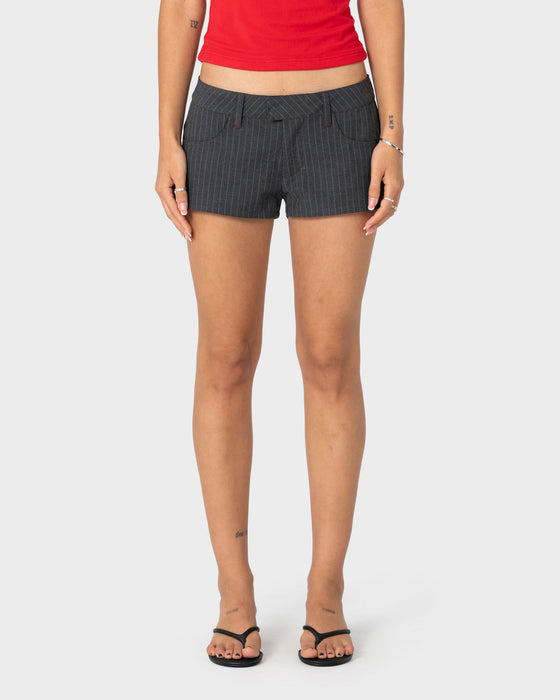 woman-wearing-finance-mummy-low-rise-suit-short-in-grey-pin-stripe