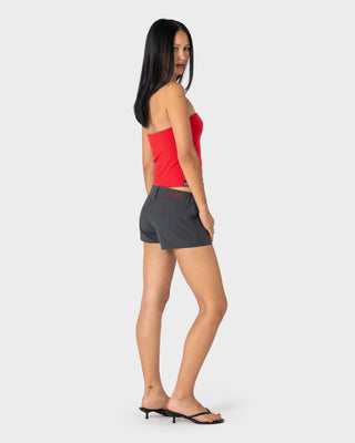 Woman wearing Finance Mummy Low Rise Suit Short in Grey Pin Stripe