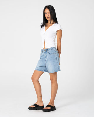 Woman wearing Cyprus High Denim Short 2.0 in Blasted True Blue