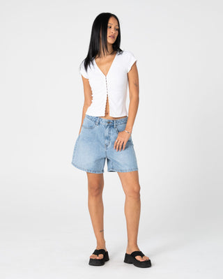 Woman wearing Cyprus High Denim Short 2.0 in Blasted True Blue