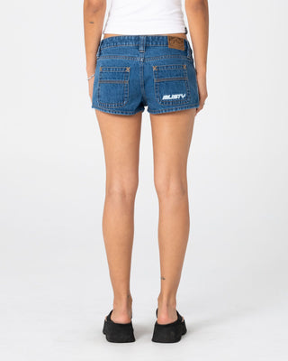 Woman wearing Flip Mommy Low Rise Micro Mini Short 2.0 in Middy Blue / Blue