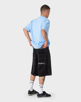 Man wearing Flip Daddy Tapeless Cord Short in Coal