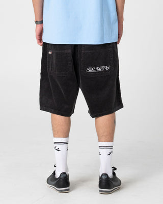 Man wearing Flip Daddy Tapeless Cord Short in Coal