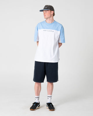 Man wearing Flip Daddy Elastic Baggy Short in Navy Blue