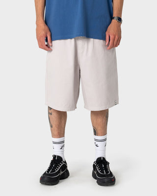 Man wearing Flip Daddy Elastic Baggy Short in Stone