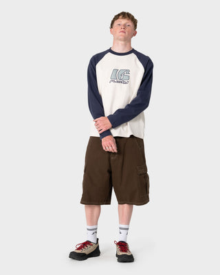 man-wearing-grizzly-baggy-cargo-short-in-pinecone