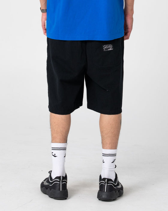 man-wearing-rumble-chino-short-in-black