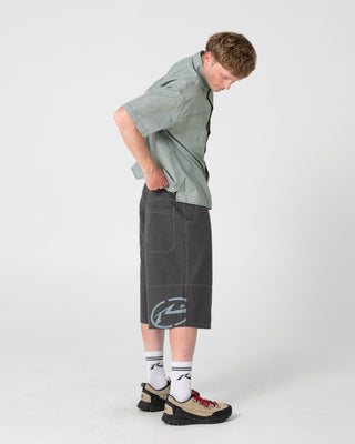 Man wearing Slapon Panel Short in Steel
