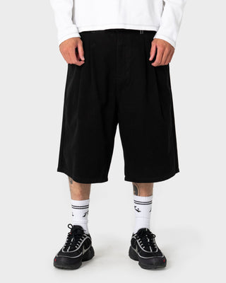 Man wearing Enigma Pleated Short in Black