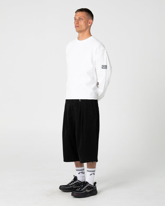 man-wearing-enigma-pleated-short-in-black