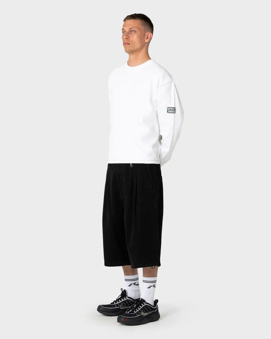 man-wearing-enigma-pleated-short-in-black