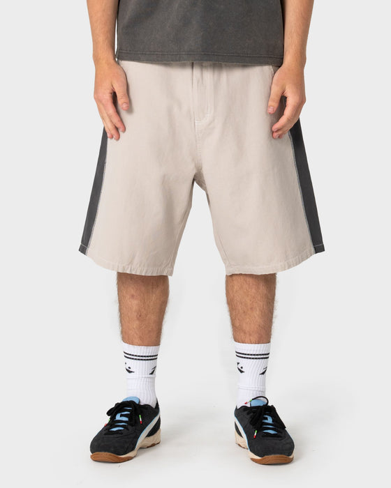man-wearing-lock-em-short-in-stone