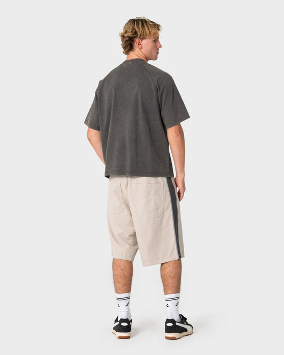 man-wearing-lock-em-short-in-stone