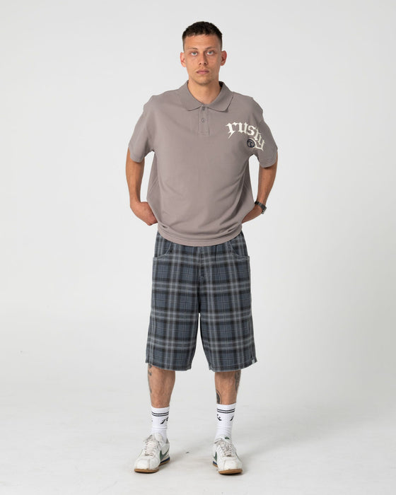man-wearing-x-press-plaid-short-in-navy-blue