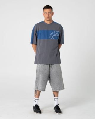 Man wearing Turbo 2.0 Baggy Jort in London Summer