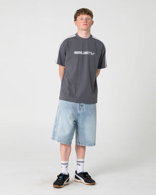 Man wearing Yowie 2.0 Wide Baggy Jort in Blasted True Blue
