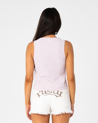 Woman wearing Peggy Sue Sleeveless Button Down Blouse in Pink A Boo