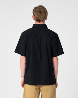 Man wearing Datsun Classic Short Sleeve Shirt in Black