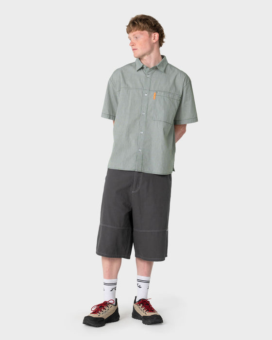 man-wearing-south-central-short-sleeve-shirt-in-green