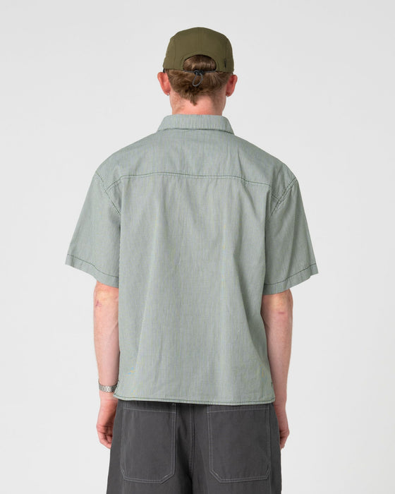 man-wearing-south-central-short-sleeve-shirt-in-green