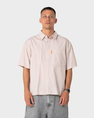 Man wearing South Central Short Sleeve Shirt in Ochre